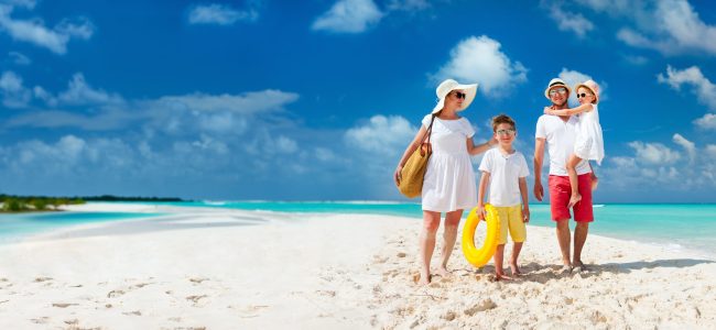 Tropical beach paradise and turquoise water representing hot March destinations for UK travellers.